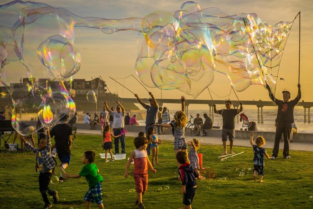 bubbles, party, kids, jumping, fun, sunset, nature, beach, pier, brown beach, brown sunset, brown party, brown fun, brown bubbles, party, party, party, party, party